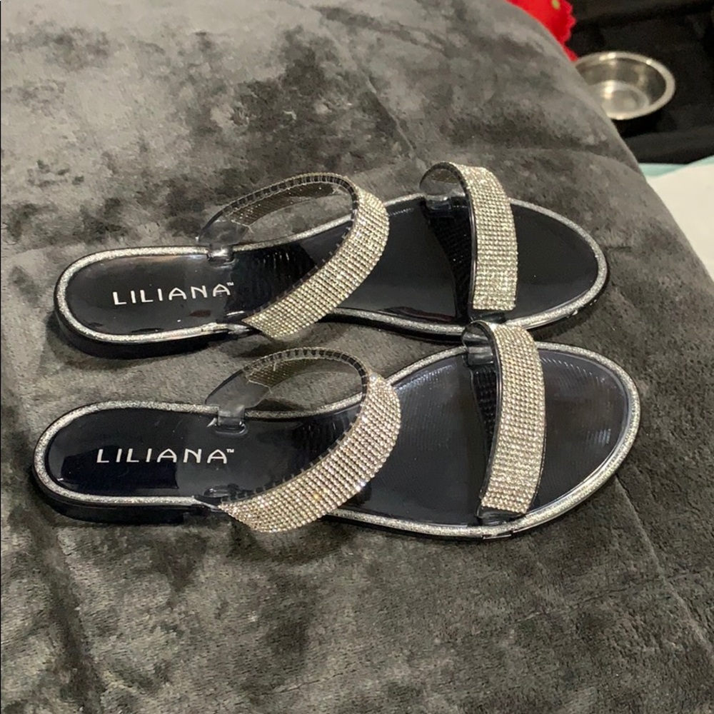 Black sandals with rhinestone detail